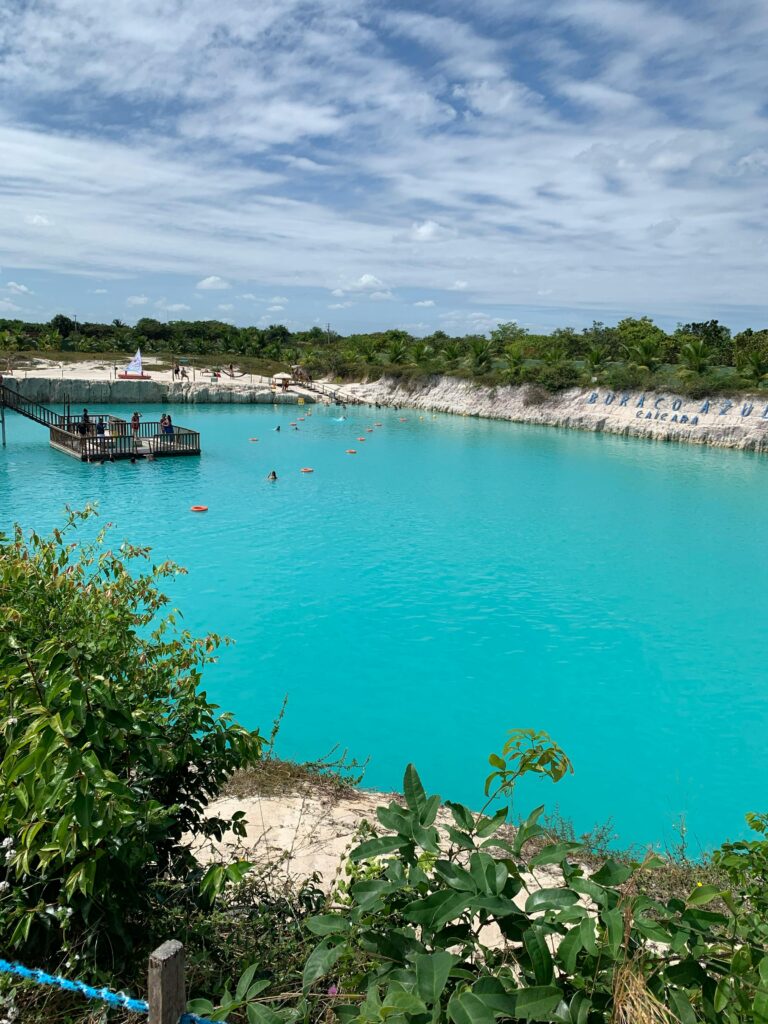 pexels-photo-13132299-13132299 Clear blue waters of Buraco Azul lagoon in Brazil with a dock and scenic surroundings.